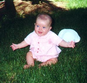 I just learned how to sit on my own.  I am getting so good at it.