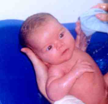 Aine taking her first bath